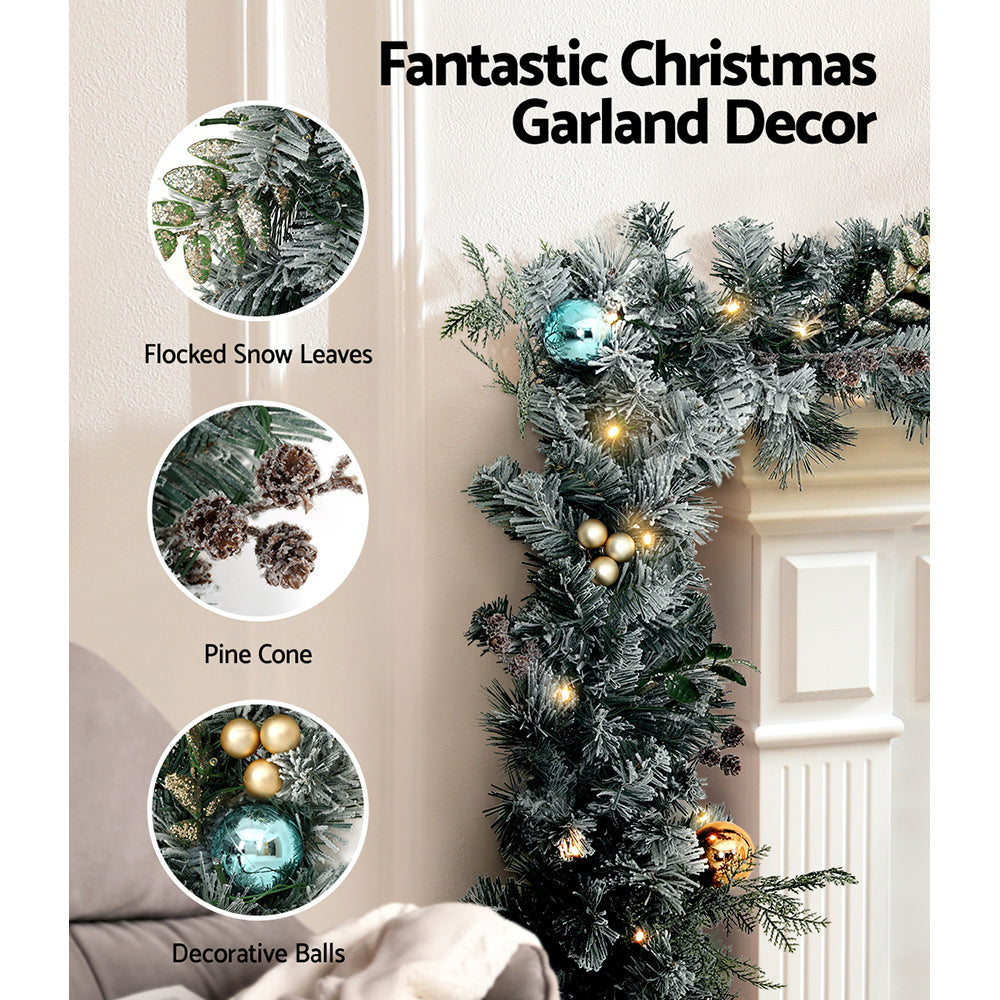 2.7M Pre-Lit Snow Frosted Christmas Garland with Pinecones & Baubles