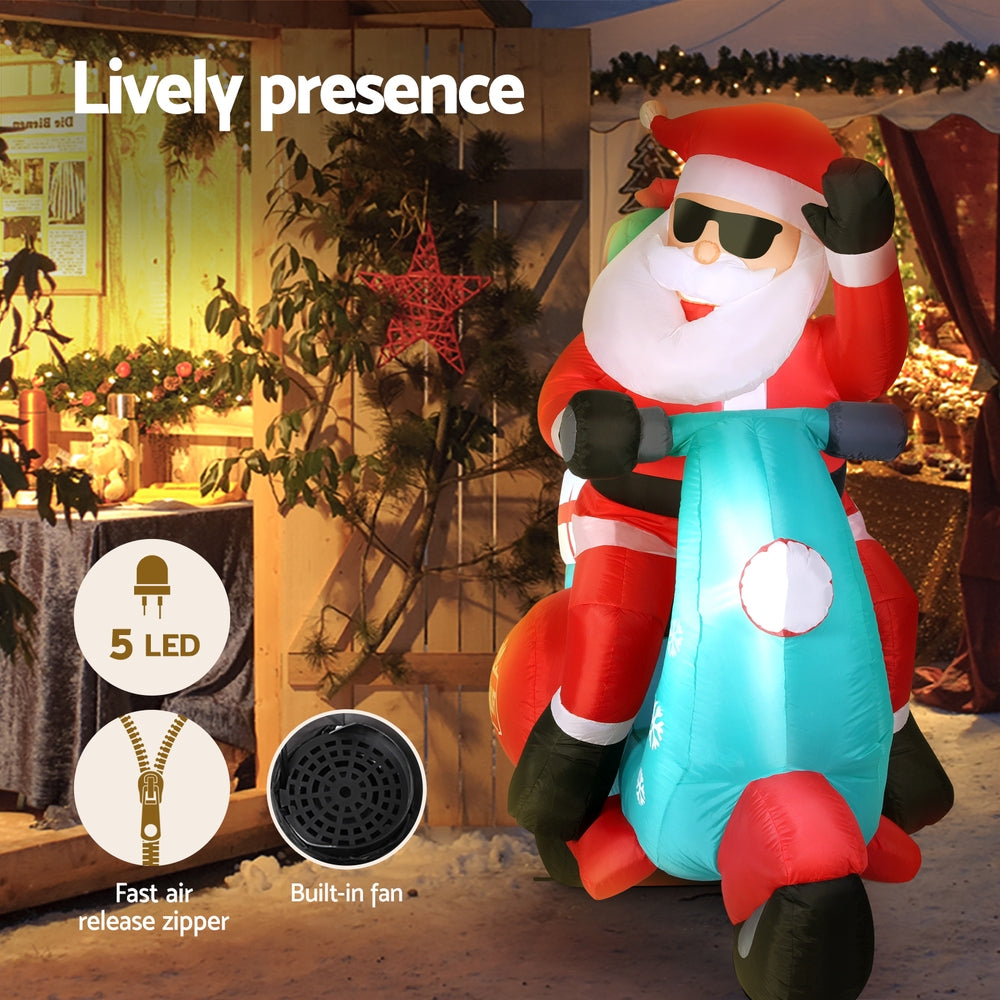 1.8M Santa Riding Scooter Christmas Inflatable with LED Lights
